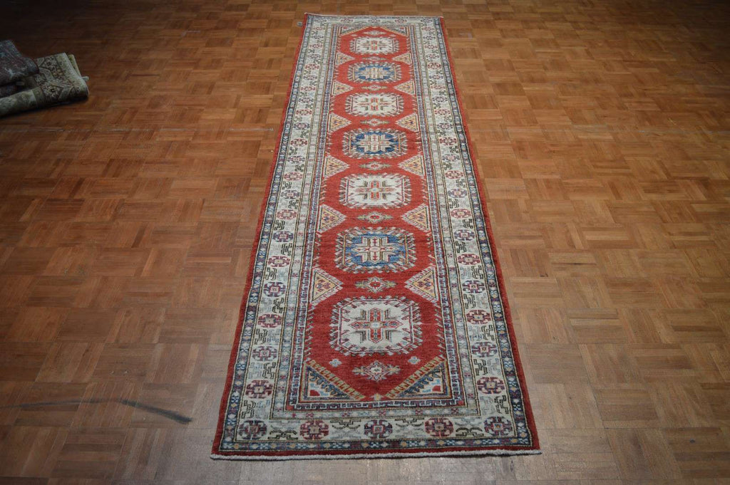 2' 9" x 10' 5" Pakistan Kazak Runner image 1