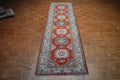 2' 9" x 10' 5" Pakistan Kazak Runner image 1