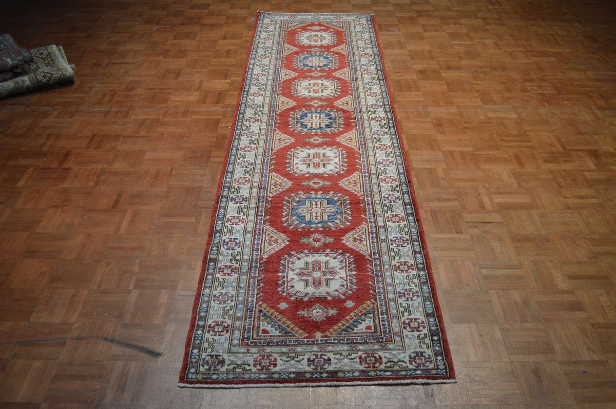 2' 9" x 10' 5" Pakistan Kazak Runner image 1