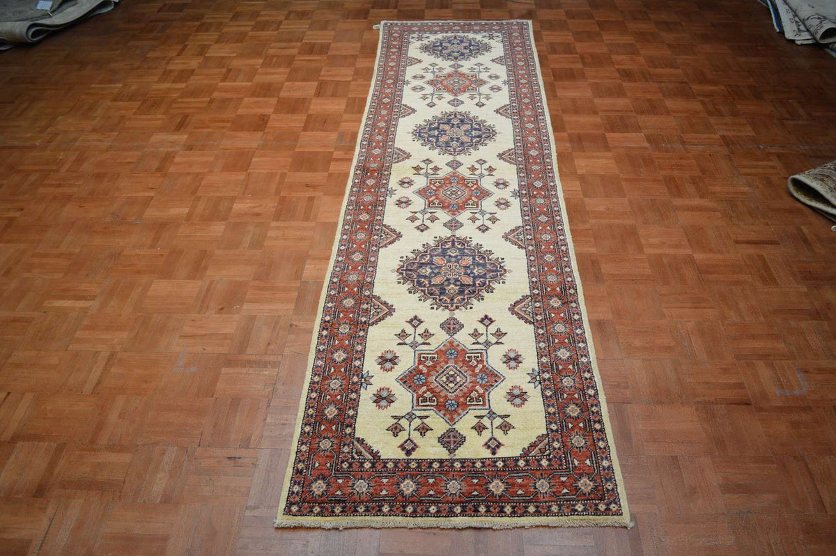 2' 6" x 9' 5" Pakistan Kazak Runner image 1