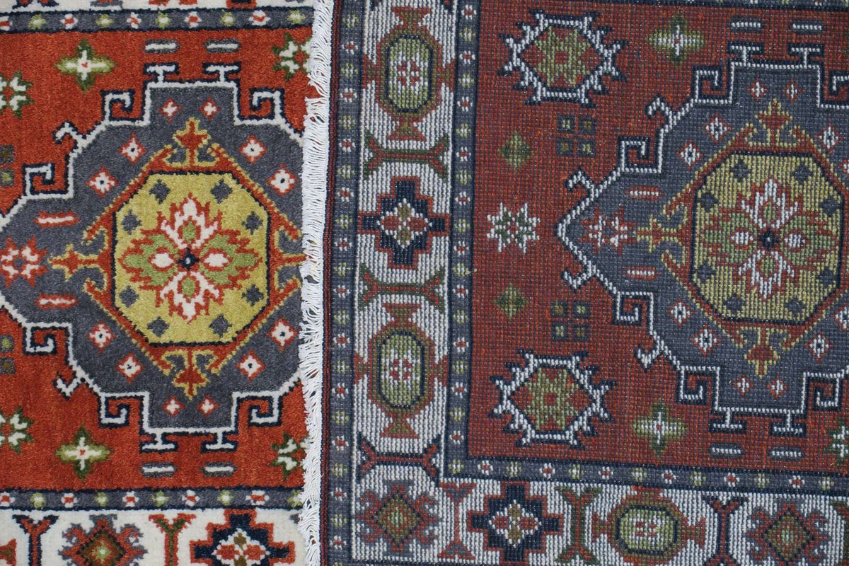 2' 8" x 9' 9" India Kazak Runner image 1